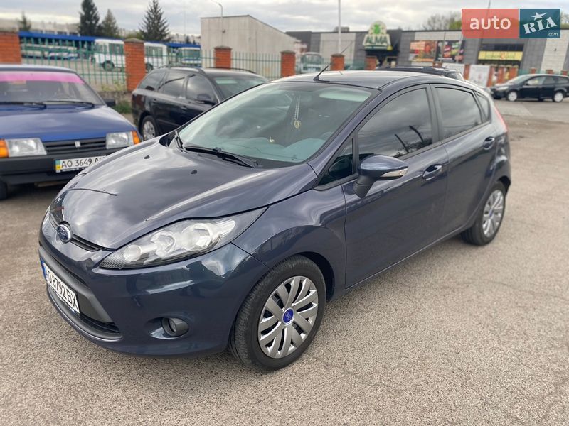 2011 Ford Fiesta, VIN WF0JXXGAJJBC18708:plate — фото 1 (autoria)