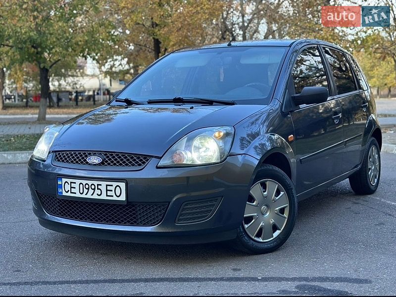 2005 Ford Fiesta, VIN WF0HXXGAJH5K30164:plate — фото 1 (autoria)