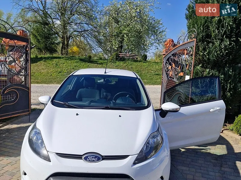 Ford Fiesta 2011 VIN WF0JXXGAJJBE38963 фото оголошення 18 з 47