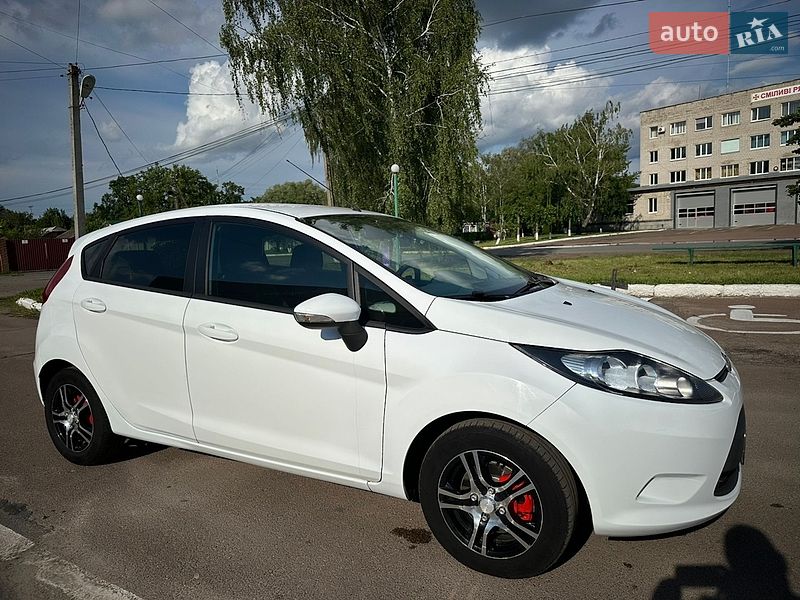 2010 Ford Fiesta, VIN WF0JXXGAJJAP34467:plate — фото 1 (autoria)