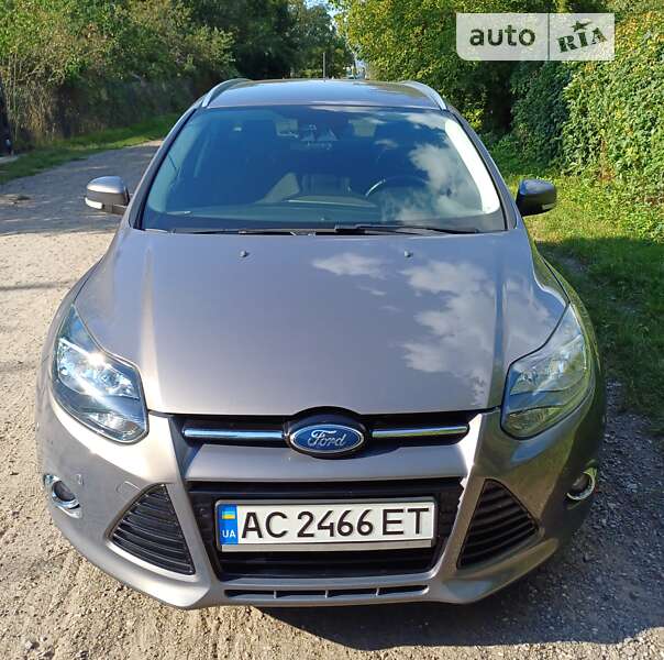 2011 Ford Focus, VIN WF0LXXGCBLBT66261:plate — zdjęcie 1 (autoria)