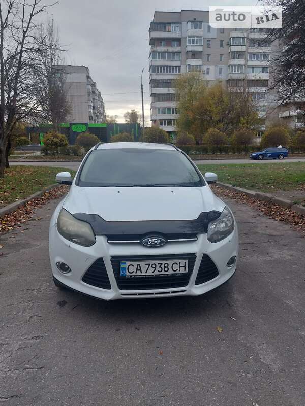 2012 Ford Focus, VIN WF0LXXGCBLCR10243:plate — zdjęcie 1 (autoria)