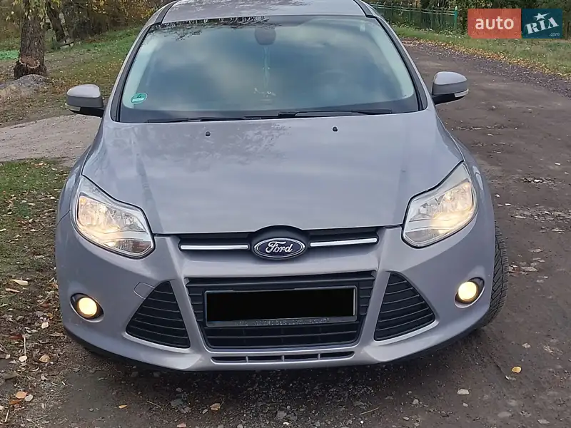 Ford Focus 2013 VIN WF0LXXGCBLDM18303 фото оголошення 25 з 56