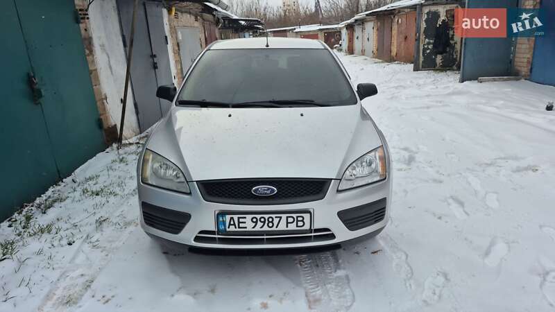 2006 Ford Focus, VIN WF0WXXGCDW6L71665:plate — фото 1 (autoria)