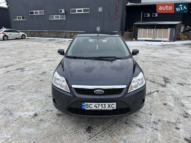 2009 Ford Focus, VIN WF0SXXGCDS9G37702:plate — фото 1 (autoria)