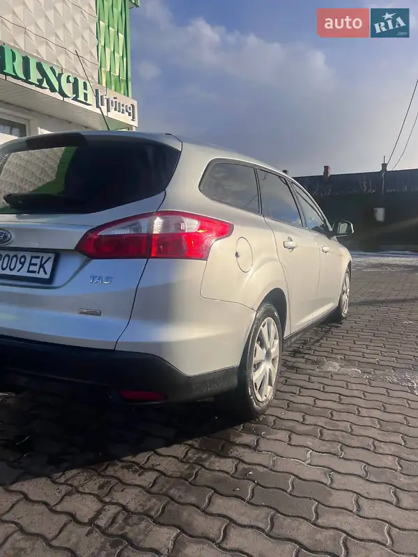Ford Focus 2013 VIN WF0LXXGCBLDM18303 фото оголошення 16 з 56