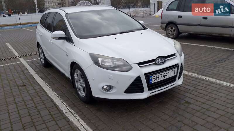 2011 Ford Focus, VIN WF0LXXGCBLBP32882:plate — фото 1 (autoria)