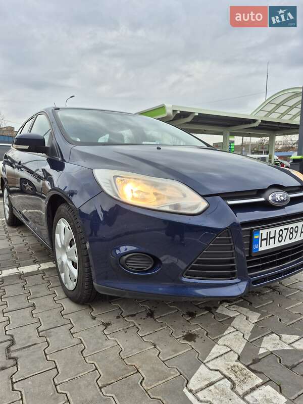 2012 Ford Focus, VIN WF0LXXGCBLCB76300:plate — фото 1 (autoria)
