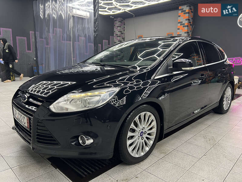 2011 Ford Focus, VIN WF0KXXGCBKBK76231:plate — фото 1 (autoria)