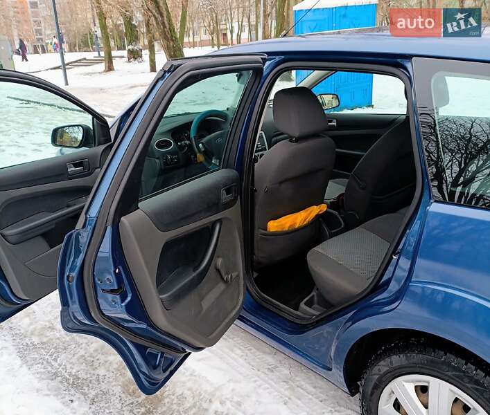 2006 Ford Focus, VIN WF0WXXGCDW6A82677:plate — фото 1 (autoria)