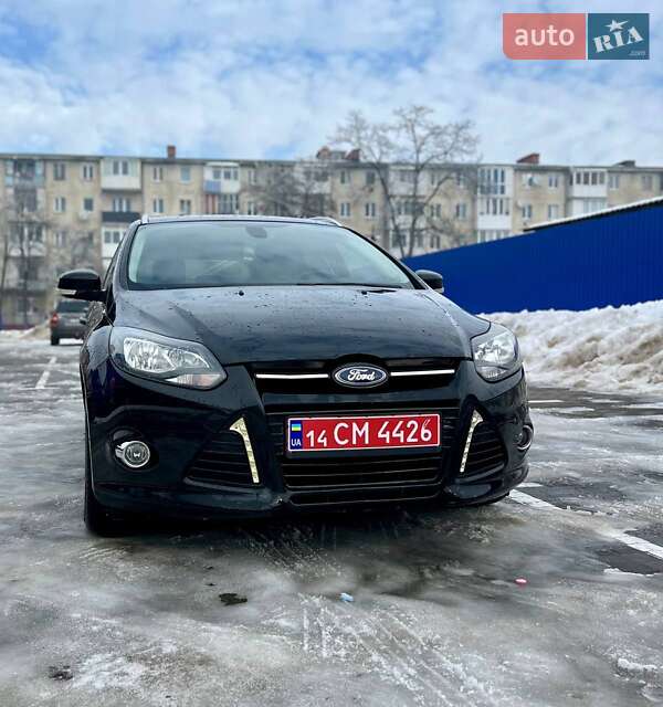 2012 Ford Focus, VIN WF0LXXGCBLCR78288:plate — фото 1 (autoria)