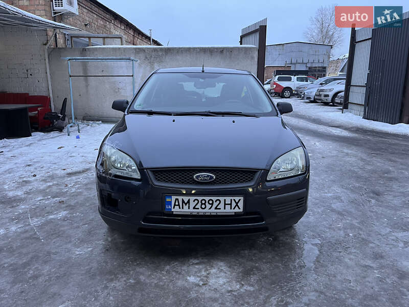 2006 Ford Focus, VIN WF05XXWPD56M44499:plate — photo 1 (autoria)