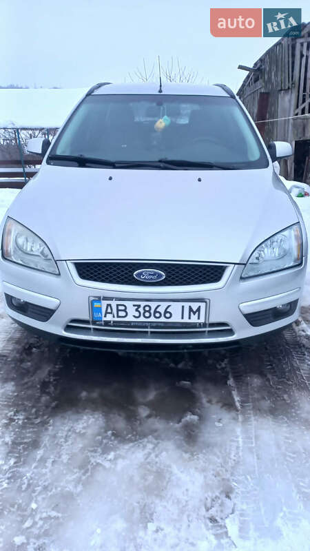 2007 Ford Focus, VIN WF0WXXGCDW7T03670:plate — фото 1 (autoria)