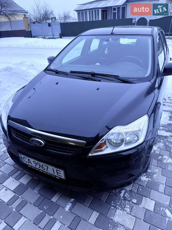 2008 Ford Focus, VIN WF0SXXGCDS8G32015:plate — фото 1 (autoria)