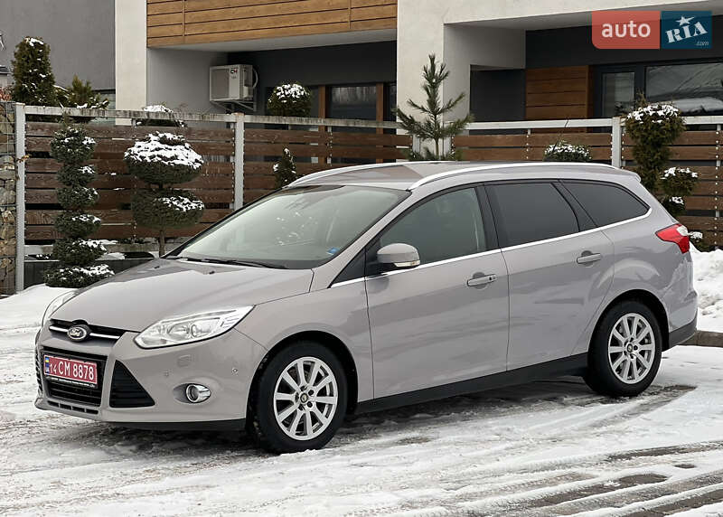 2011 Ford Focus, VIN WF0LXXGCBLBU74186:plate — фото 1 (autoria)