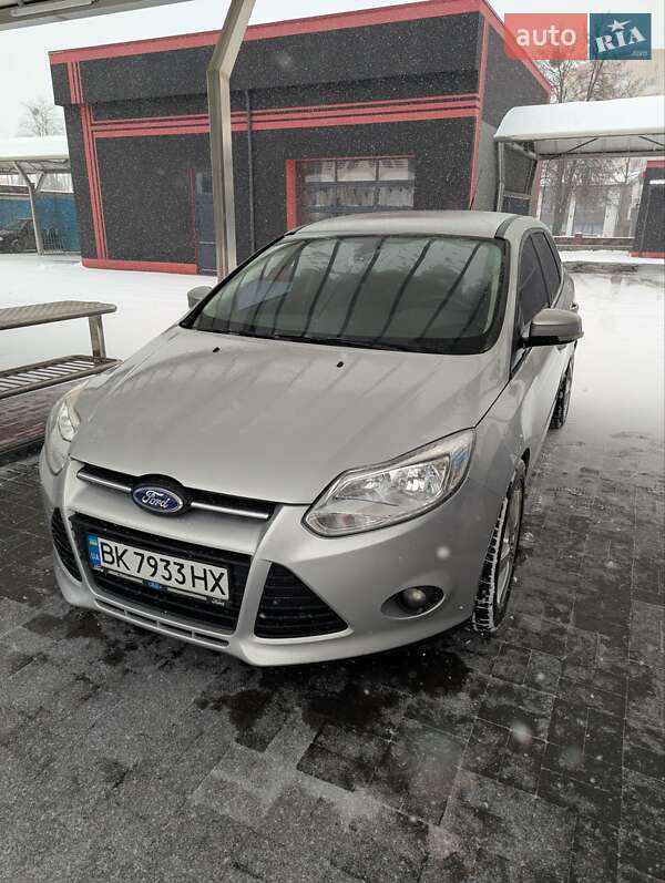 2013 Ford Focus, VIN WF0LXXGCBLDB74219:plate — фото 1 (autoria)
