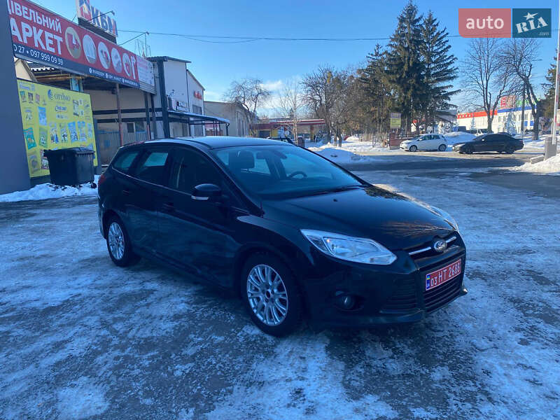 2012 Ford Focus, VIN WF0LXXGCBLBU51637:plate — фото 1 (autoria)