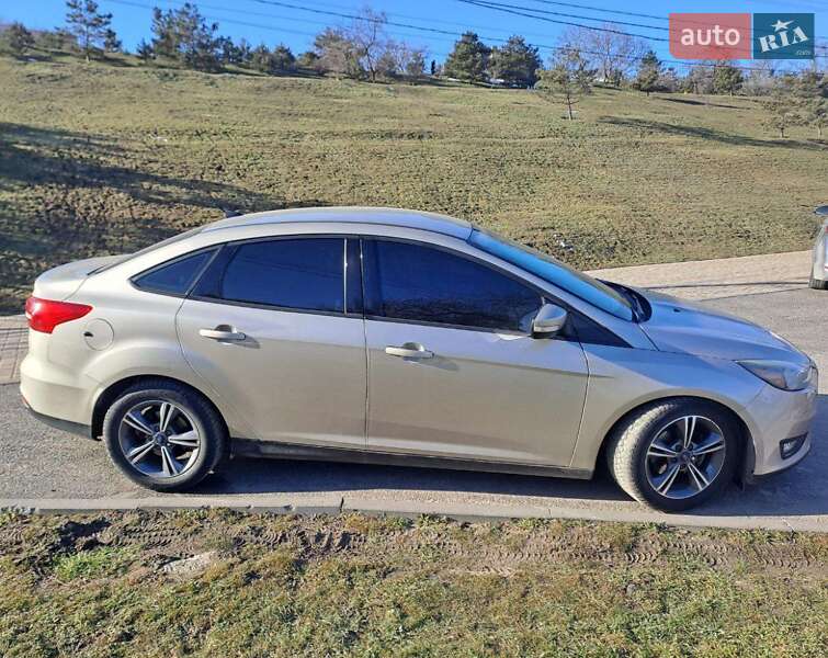 2017 Ford Focus SE, VIN 1FADP3FE9HL276369:plate — фото 1 (autoria)