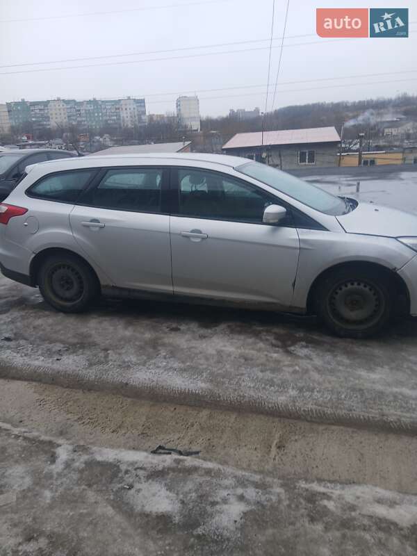 2011 Ford Focus, VIN WF0LXXGCBLBP25801:plate — фото 1 (autoria)
