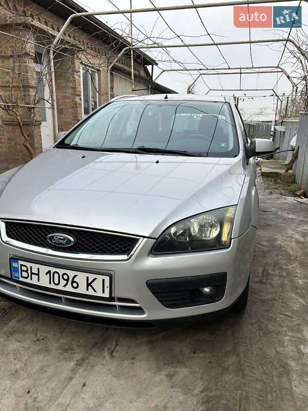 2006 Ford Focus, VIN WF0WXXGCDW6M21685:plate — фото 1 (autoria)