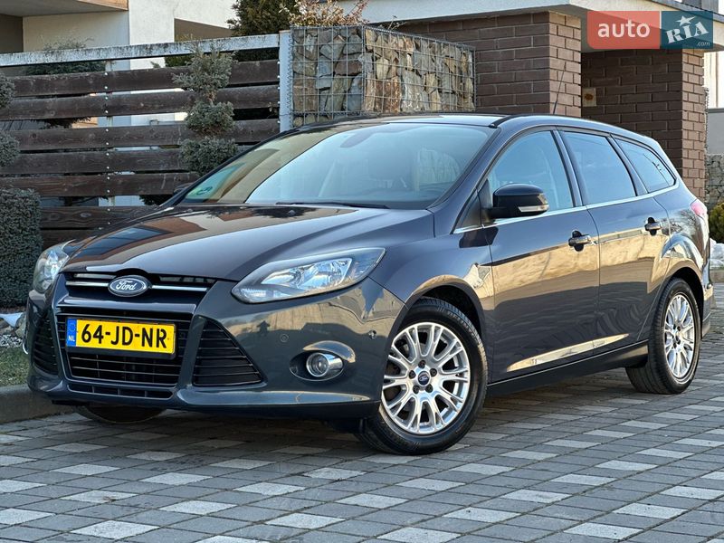 2012 Ford Focus, VIN WF0LXXGCBLCB73336:plate — фото 1 (autoria)