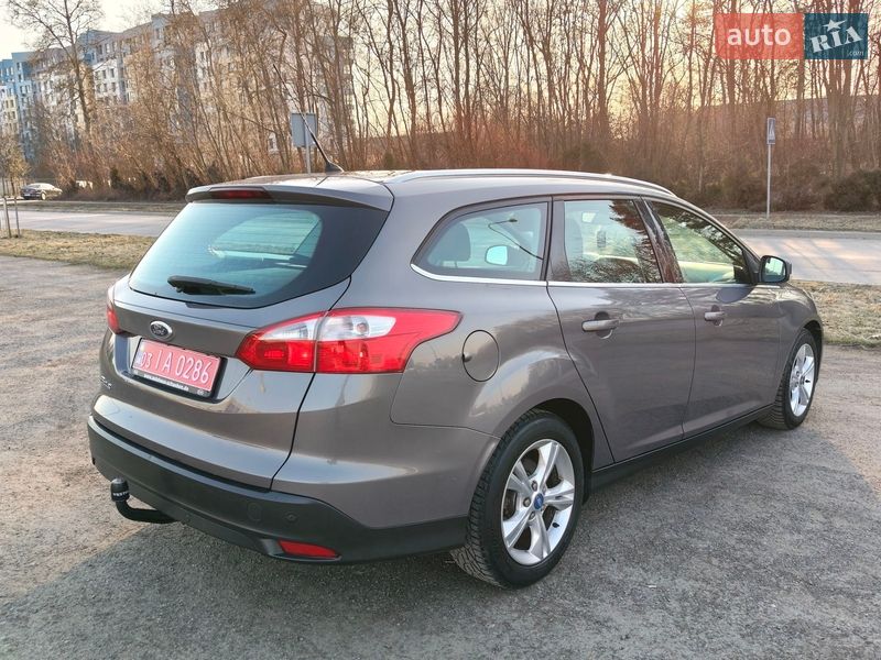 2012 Ford Focus, VIN WF0LXXGCBLCC23617:plate — фото 1 (autoria)