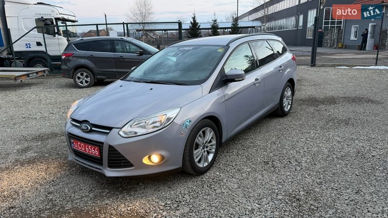 2011 Ford Focus, VIN WF0LXXGCBLBS54921:plate — фото 1 (autoria)