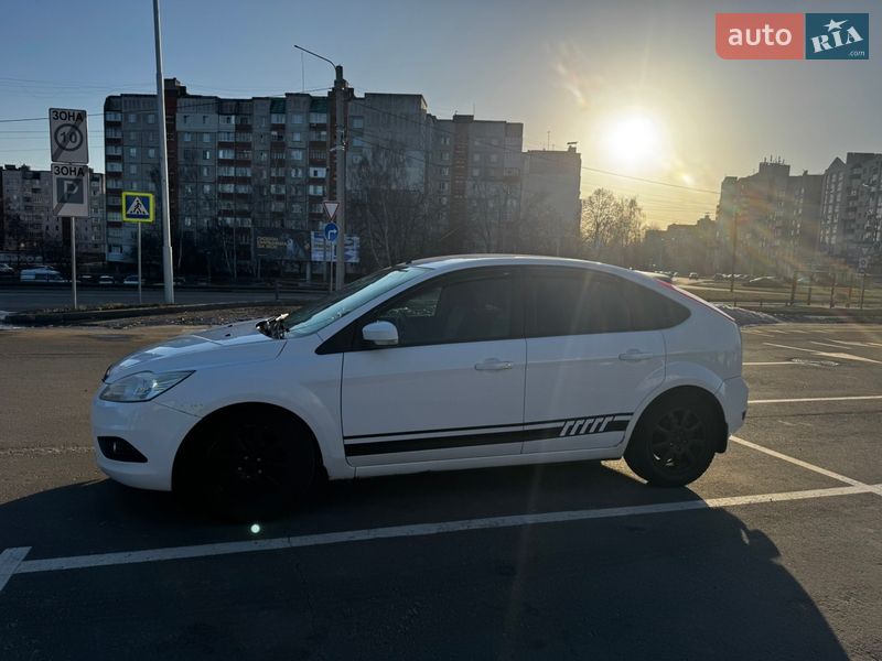 2011 Ford Focus, VIN WF0PXXWPDPBC73279:plate — фото 1 (autoria)