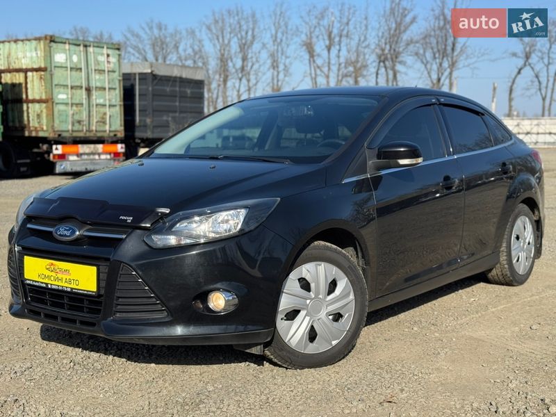 2012 Ford Focus, VIN WF0MXXGCBMCY81549:plate — фото 1 (autoria)