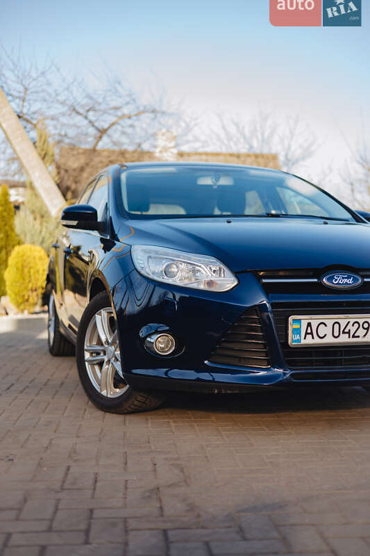 2011 Ford Focus, VIN WF0LXXGCBLBM05050:plate — фото 1 (autoria)
