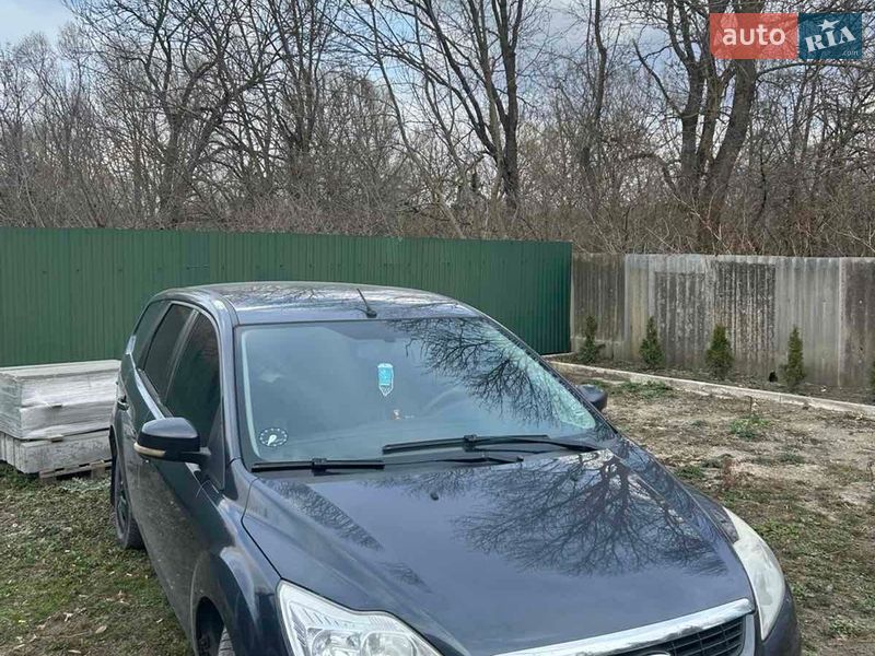 2010 Ford Focus, VIN WF0SXXGCDSAA70404:plate — фото 1 (autoria)