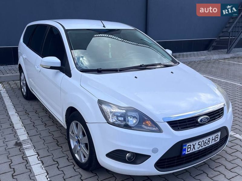 2009 Ford Focus, VIN WF0SXXGCDS9J33781:plate — фото 1 (autoria)