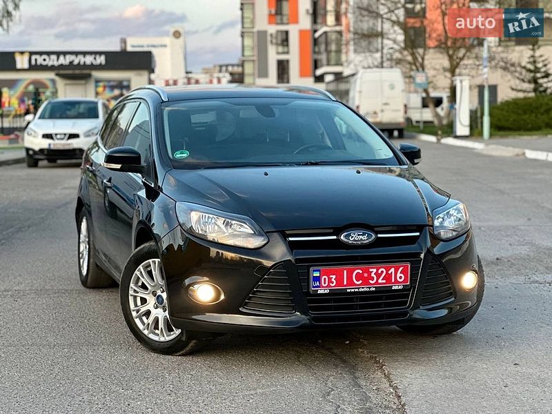 2011 Ford Focus, VIN WF0LXXGCBLBL00981:plate — фото 1 (autoria)