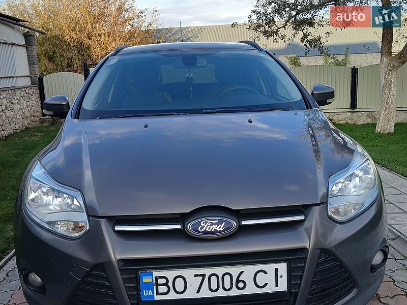 2012 Ford Focus, VIN WF0LXXGCBLCS18699:plate — фото 1 (autoria)