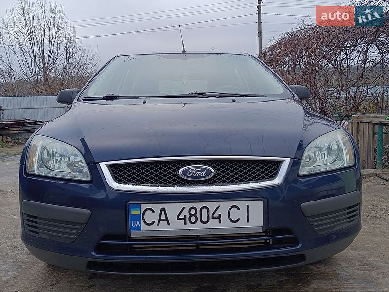 2006 Ford Focus, VIN WF0WXXGCDW6Y23881:plate — фото 1 (autoria)
