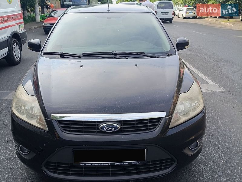 2008 Ford Focus, VIN WF0HXXWPDH8L47689:plate — фото 1 (autoria)
