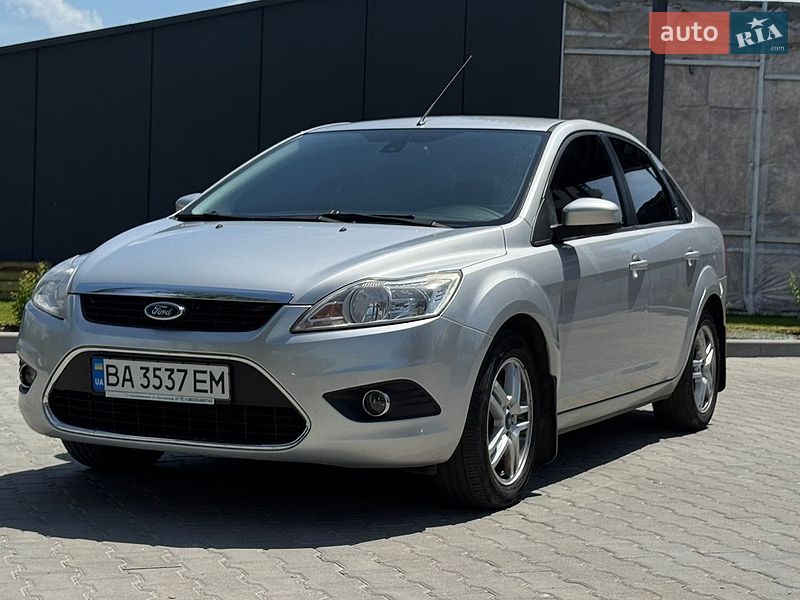 2008 Ford Focus, VIN WF0HXXWPDH8C43562:plate — фото 1 (autoria)
