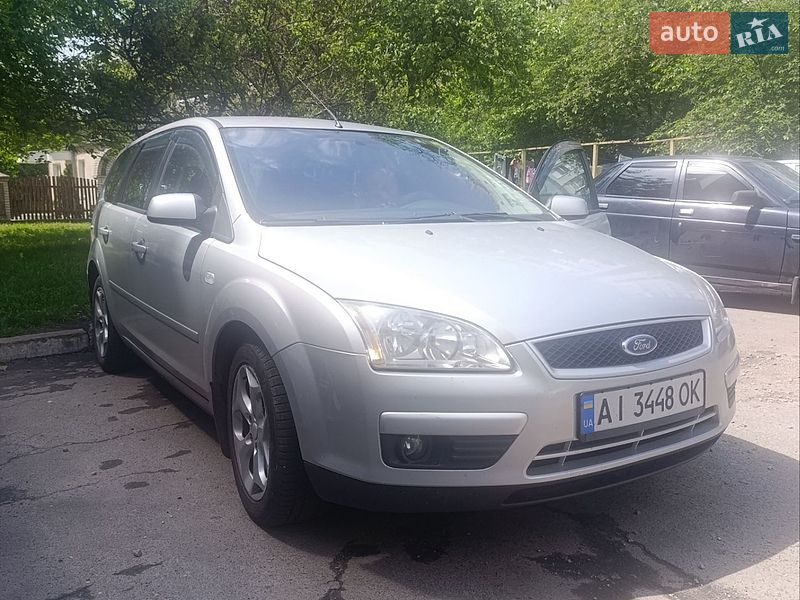 2007 Ford Focus, VIN WF0WXXGCDW7E63034:plate — фото 1 (autoria)