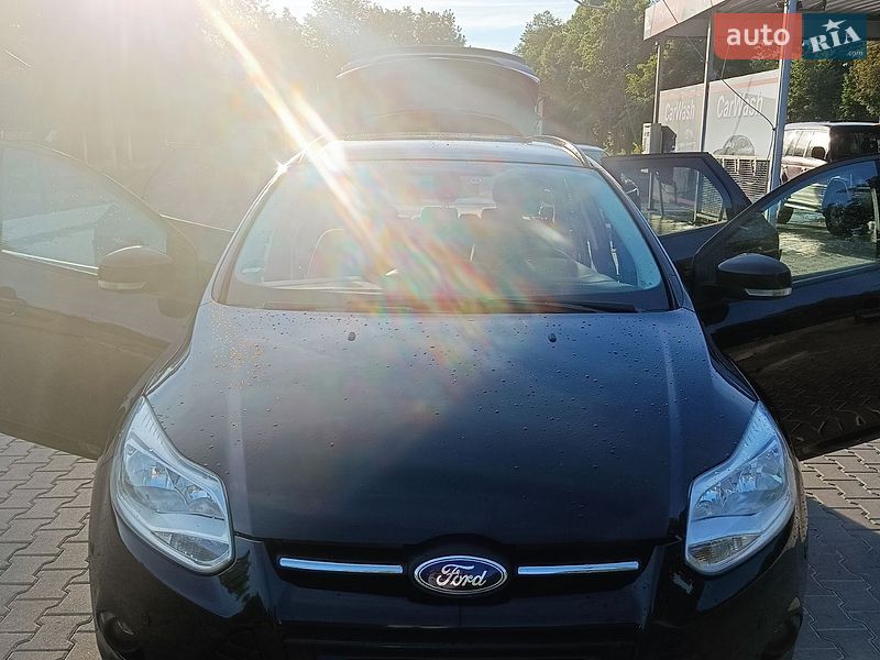 2014 Ford Focus, VIN WF0LXXGCBLEL53897:plate — фото 1 (autoria)