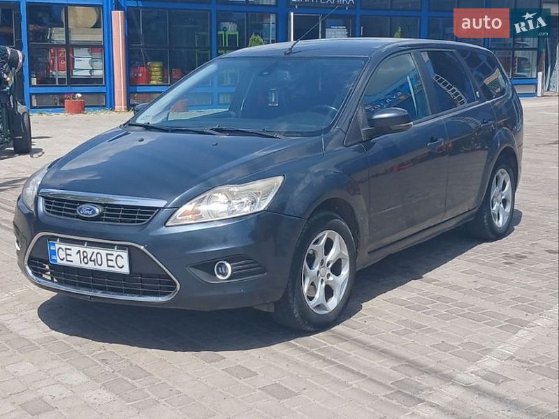 2009 Ford Focus, VIN WF0SXXGCDS9R80206:plate — фото 1 (autoria)