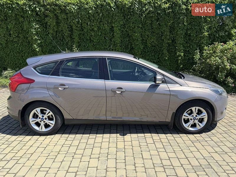 2011 Ford Focus, VIN WF0KXXGCBKBP31176:plate — фото 1 (autoria)