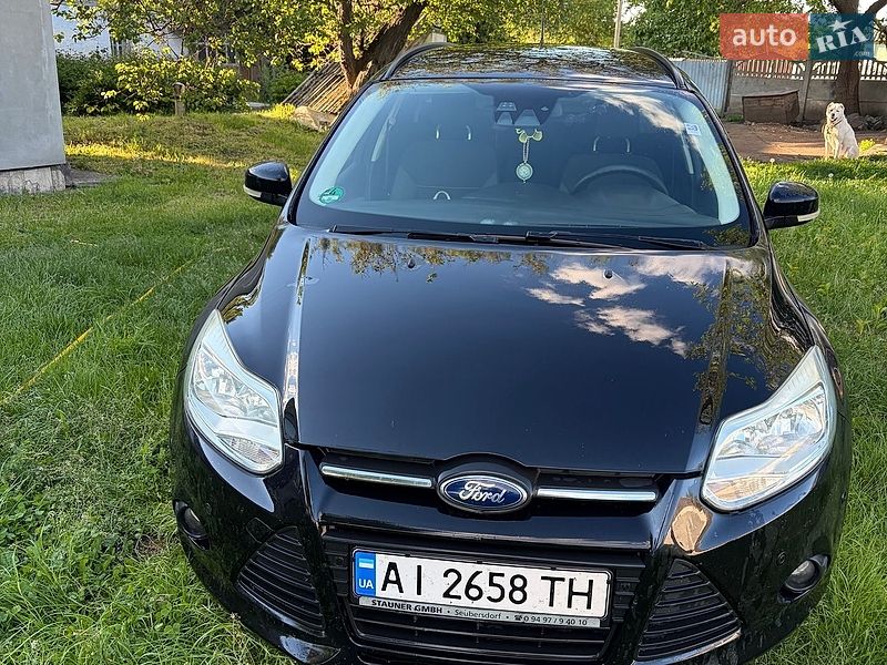 2012 Ford Focus, VIN WF0LXXGCBLCA23055:plate — фото 1 (autoria)