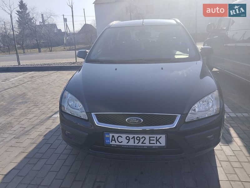 2006 Ford Focus, VIN WF0WXXGCDW5D16393:plate — фото 1 (autoria)