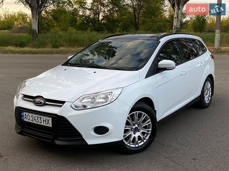 2013 Ford Focus, VIN WF0LXXGCBLDK02855:plate — фото 1 (autoria)