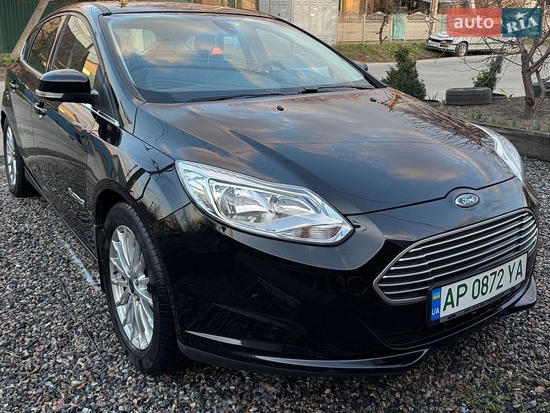 2013 Ford Focus, VIN WF0KXXGCBEDK03341:plate — фото 1 (autoria)