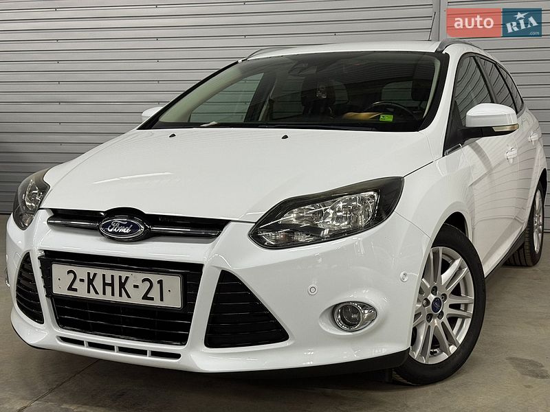 2012 Ford Focus, VIN WF0LXXGCBLCY71640:plate — фото 1 (autoria)