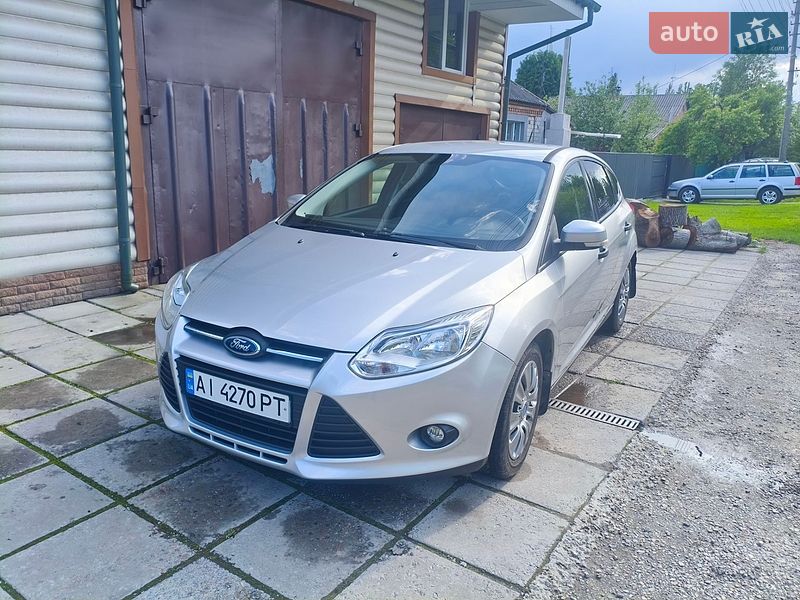 2012 Ford Focus, VIN WF0KXXGCBKCA53487:plate — фото 1 (autoria)