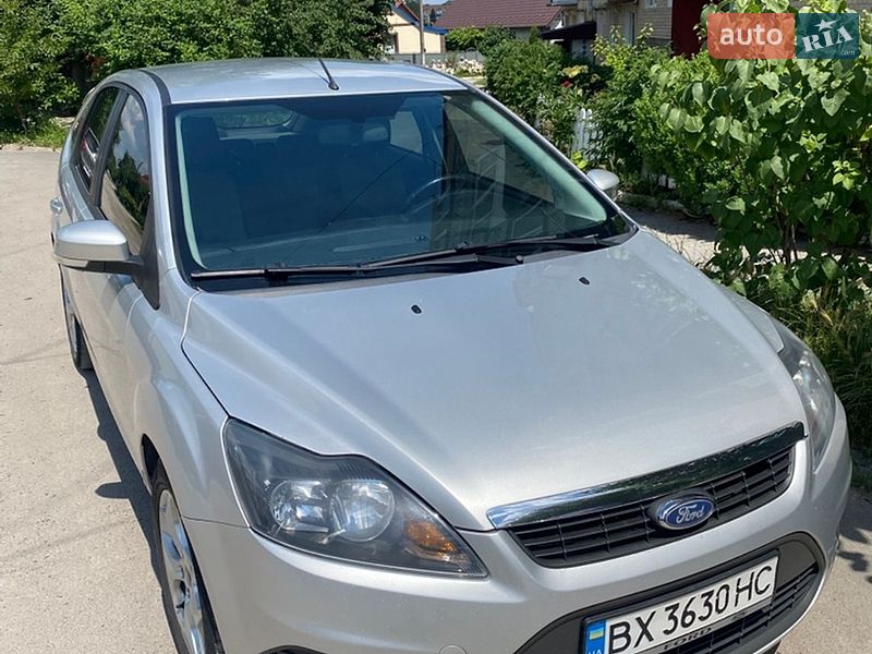 2011 Ford Focus, VIN WF0PXXWPDPBC62717:plate — фото 1 (autoria)