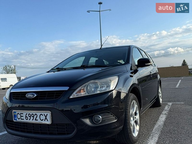 2009 Ford Focus, VIN WF0SXXGCDS9C71133:plate — фото 1 (autoria)
