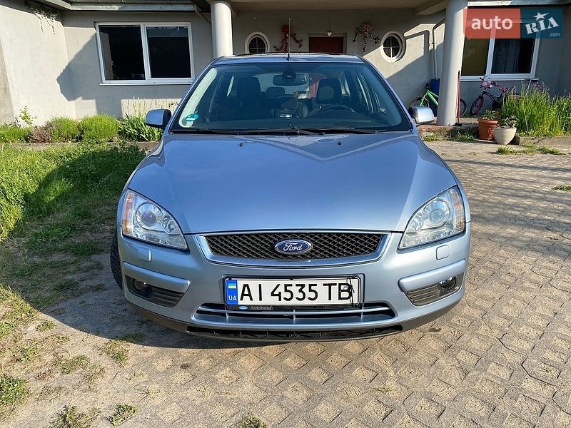 2007 Ford Focus, VIN WF0WXXGCDW7D13848:plate — фото 1 (autoria)